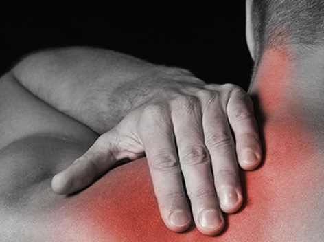 Image of man massaging his left shoulder